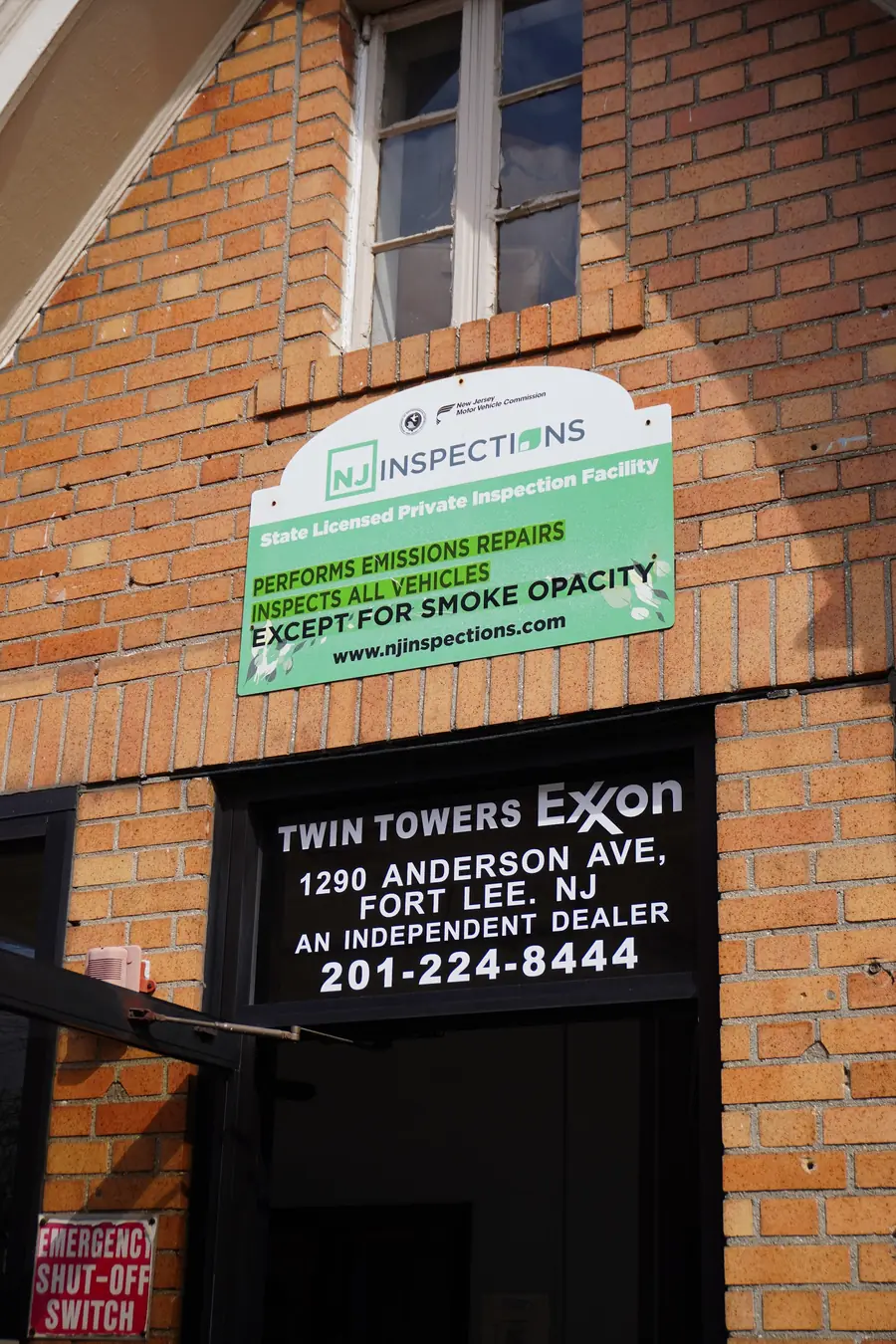 The Twin Towers sign over the garage door at 1290 Anderson Ave